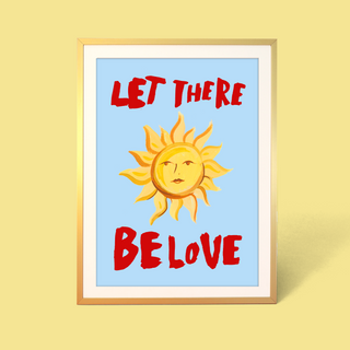 Framed artwork with a sun illustration and text 'LET THERE BE LOVE' on a light blue background.