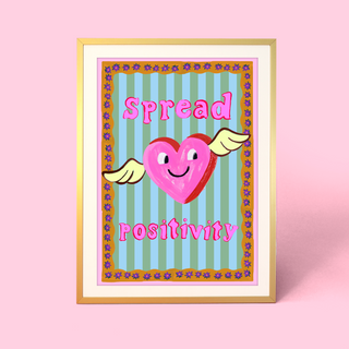 Eleanor Bowmer artwork with a heart and wings, text 'Spread Positivity', on a stripey background