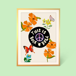 Framed artwork with floral design and 'This is Rock n' Roll' text on a light green background